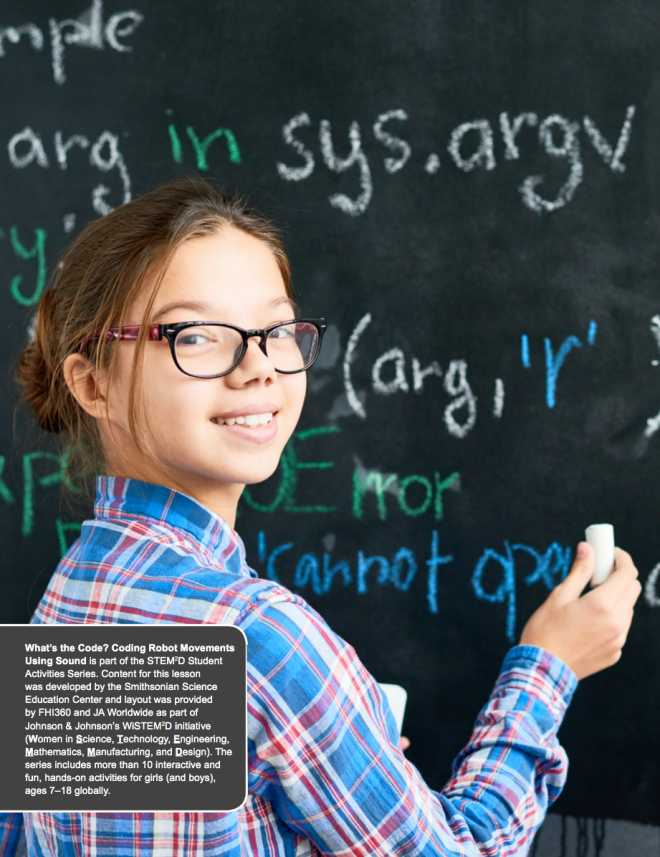 Image of a young female student writing on a blackboard