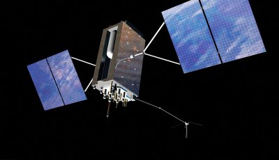 A satellite with grey body and blue solar panels orbiting Earth.