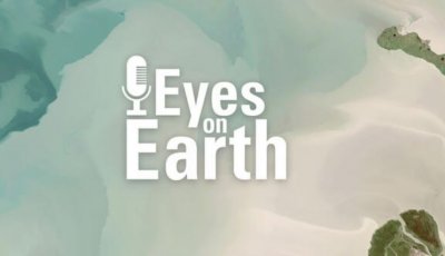 A green and white square with text that says Eyes on Earth with a microphone.