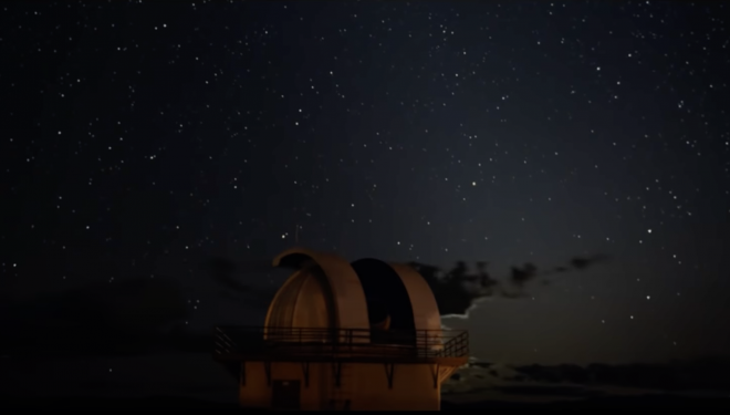 Telescope observatory at night.