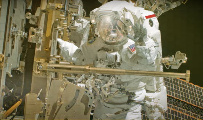 An astronaut in a spacesuit on a spacewalk.